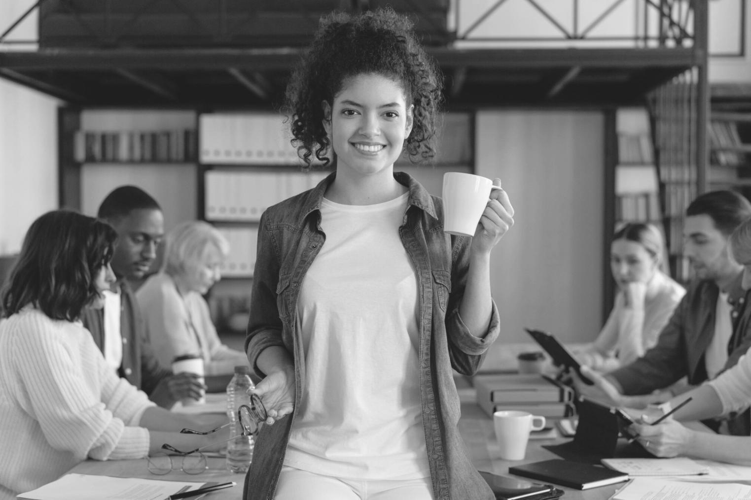 Students working through financial analysis exercises in small group setting